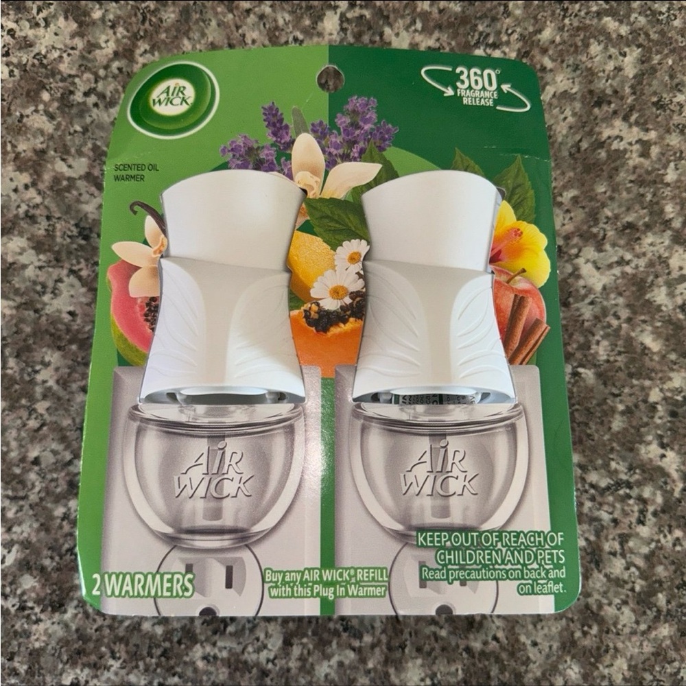 Air wick scented oil air freshener warmer